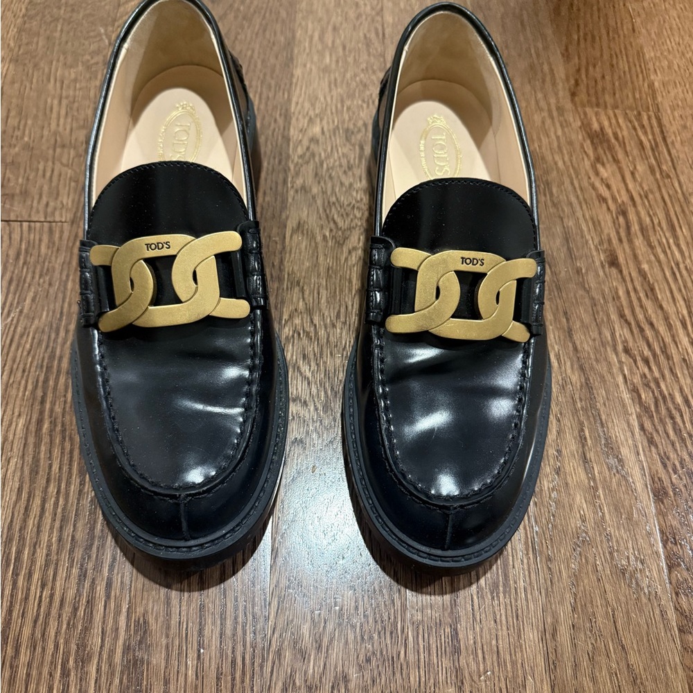 Tod's Black Loafers with Gold Chain Detail